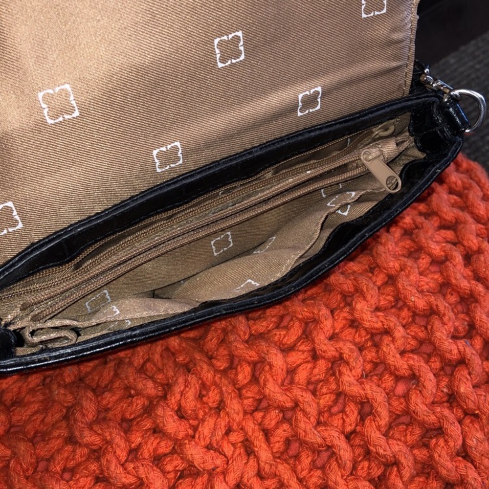 Black Lizclaiborne mini bag.